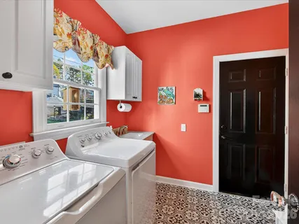 a utility room with dryer and washer