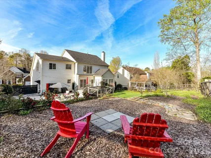 a view of a house with backyard porch and patio