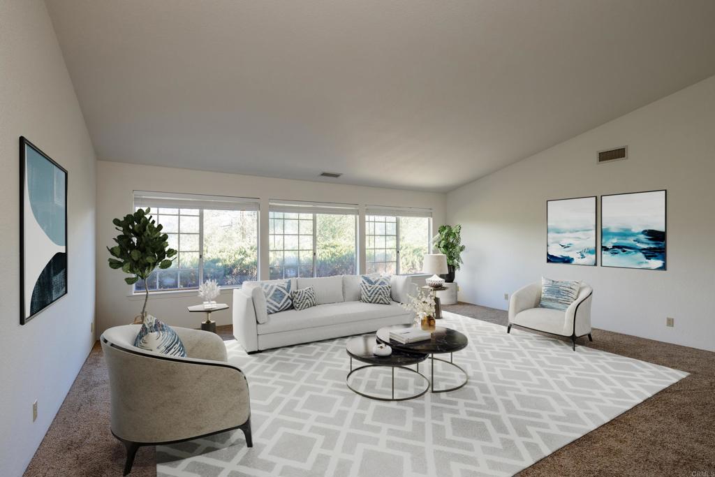a living room with furniture and a rug