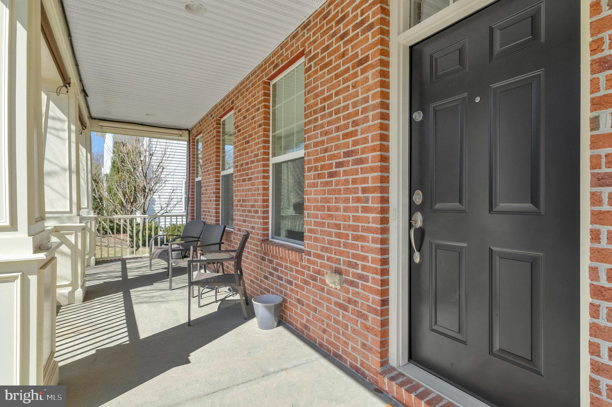 41008 Indigo Place Leesburg, VA 20175 - Photo 3 of 59 Enjoy morning coffee on this lovely porch