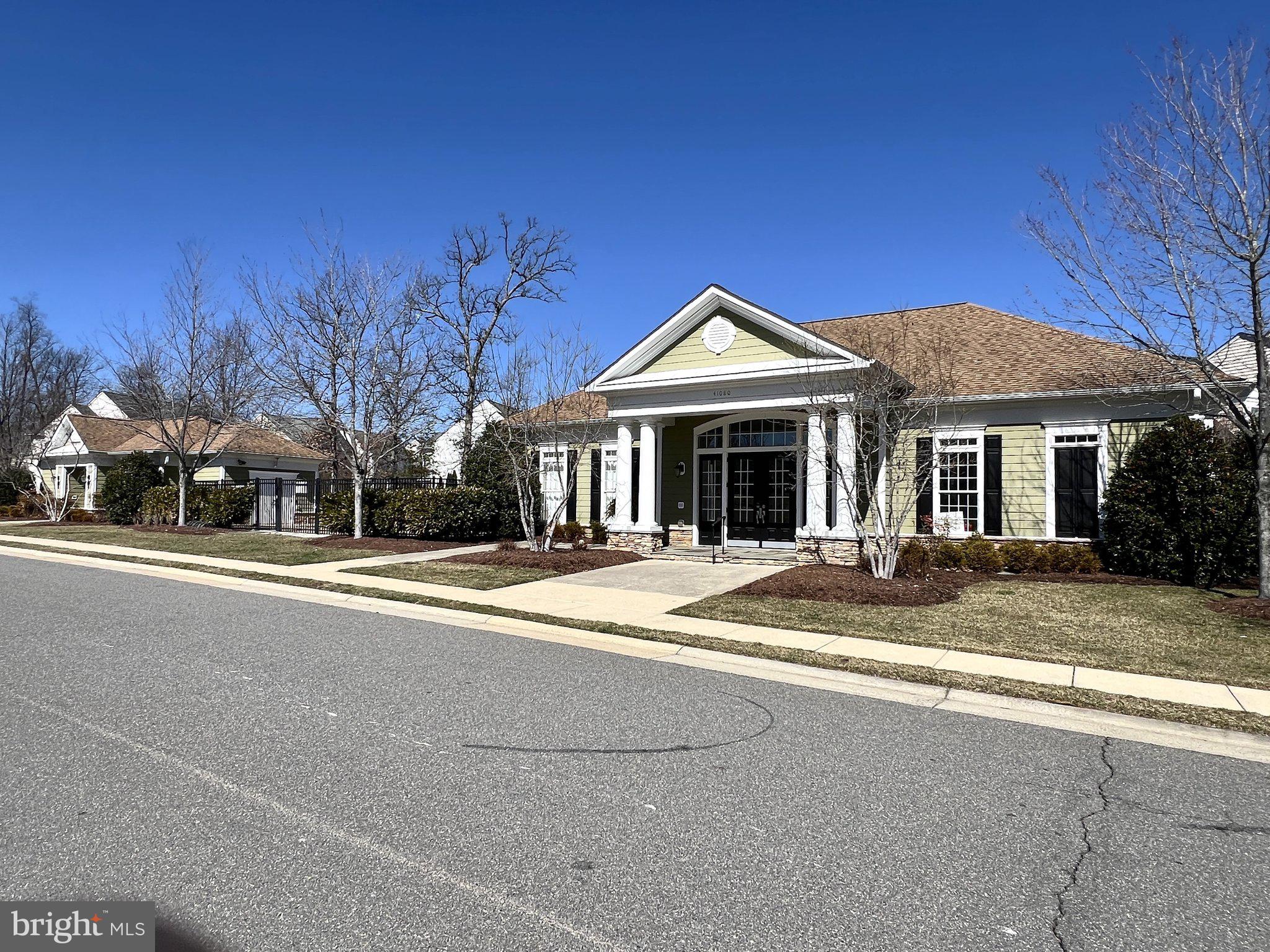 41008 Indigo Place Leesburg, VA 20175 - Photo 52 of 59 front view of a house with a yard