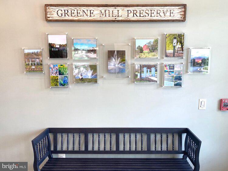 41008 Indigo Place Leesburg, VA 20175 - Photo 53 of 59 a view of a living room with furniture and a flat screen tv