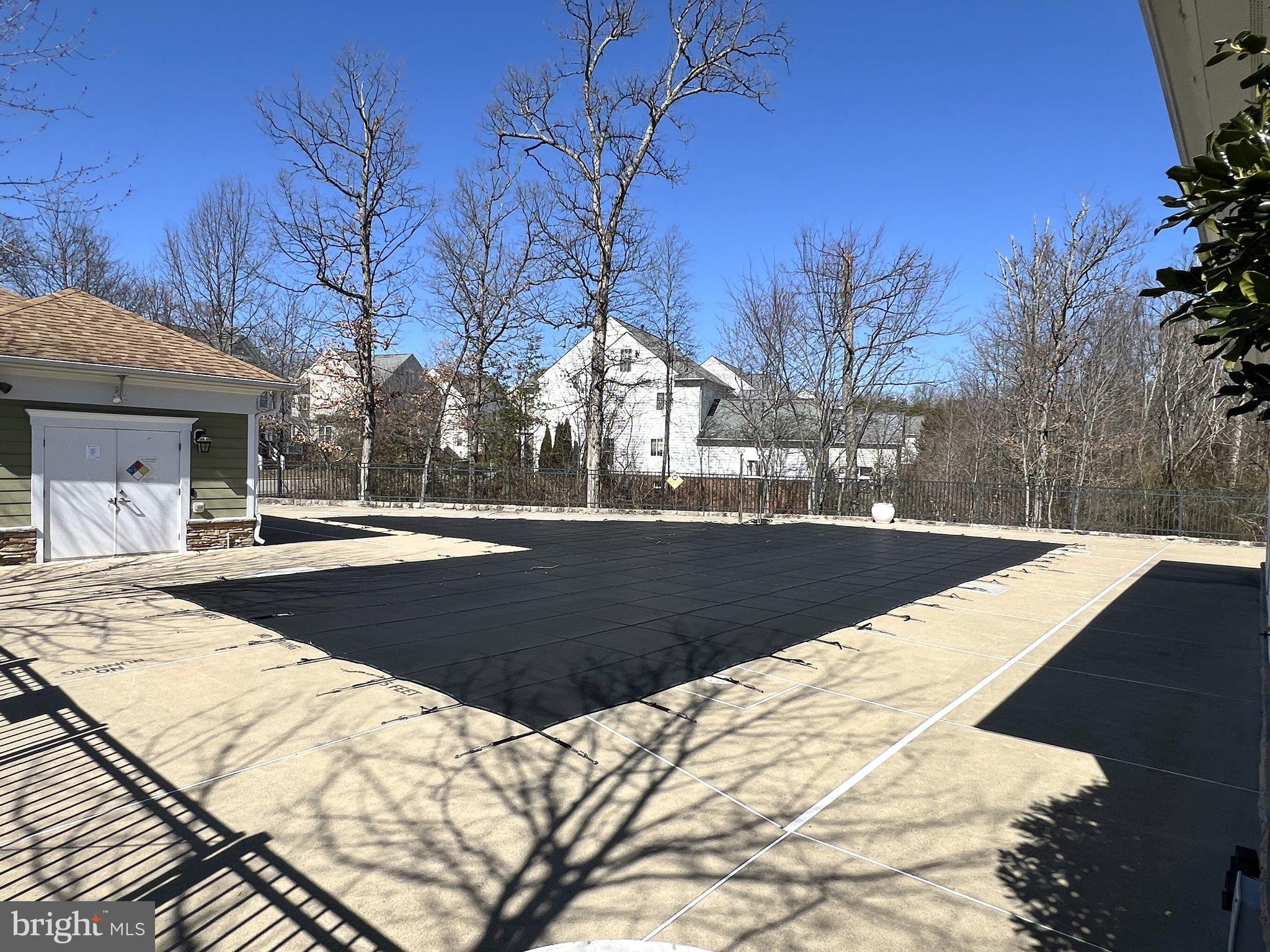 41008 Indigo Place Leesburg, VA 20175 - Photo 56 of 59 a view of outdoor space yard and swimming pool