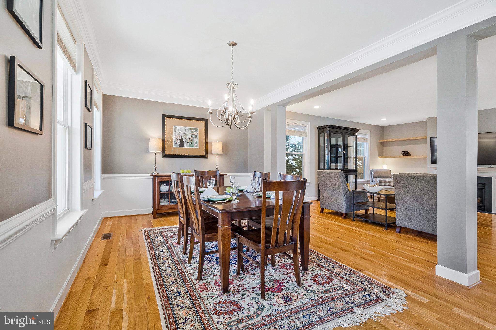 41008 Indigo Place Leesburg, VA 20175 - Photo 7 of 59 a view of a dining room with furniture