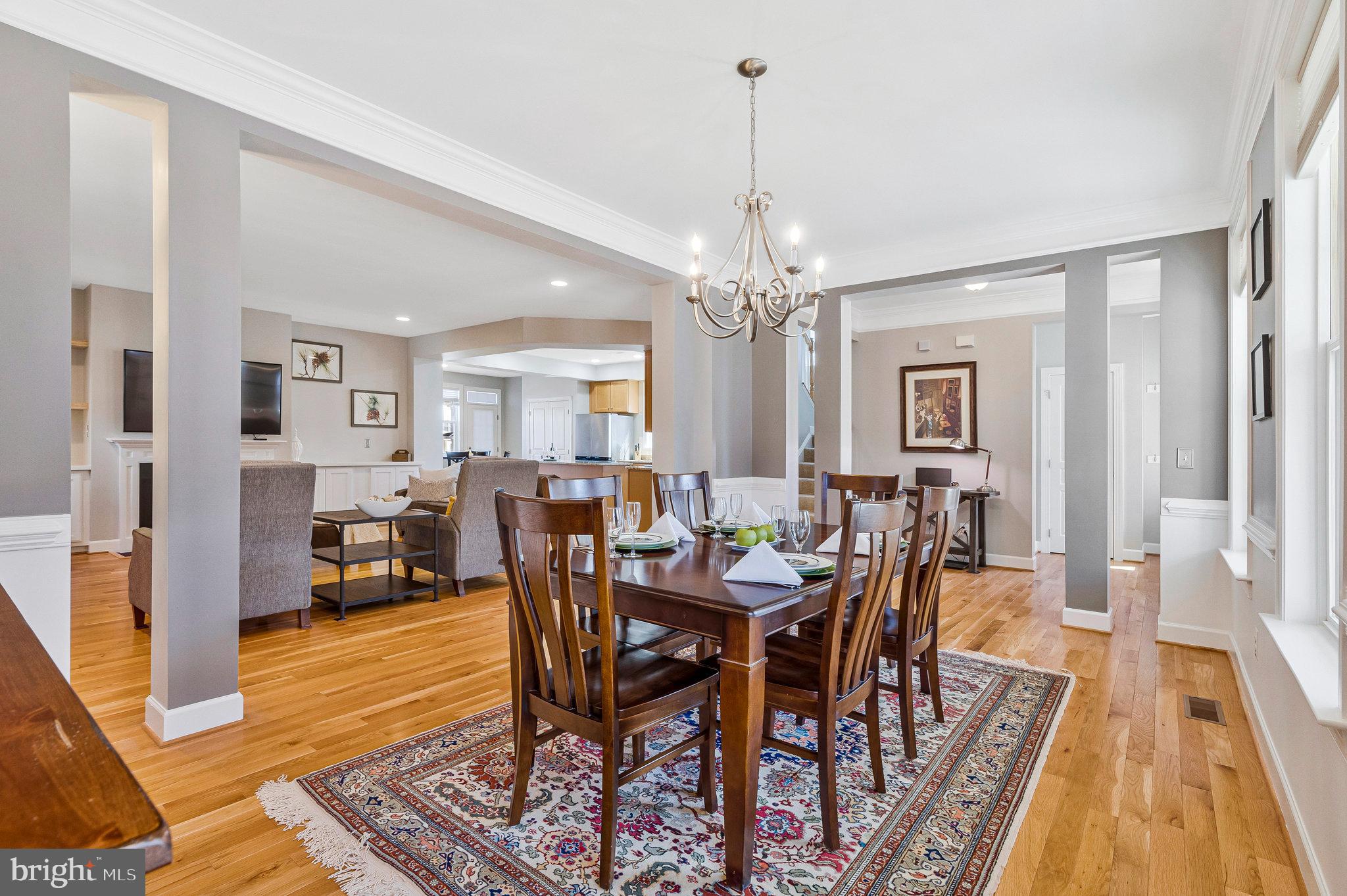 41008 Indigo Place Leesburg, VA 20175 - Photo 8 of 59 a view of a dining room with furniture