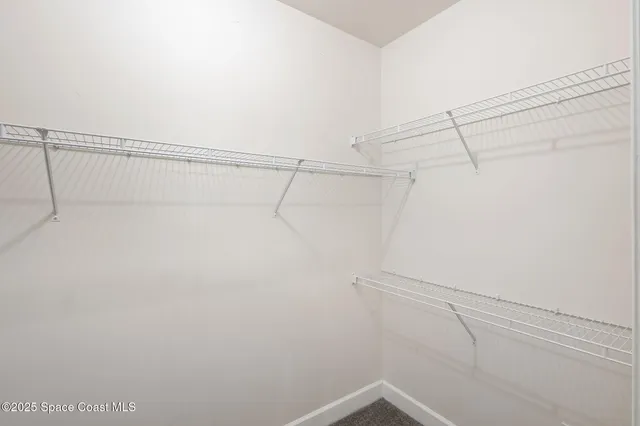 a bathroom with a sink toilet tub and shower