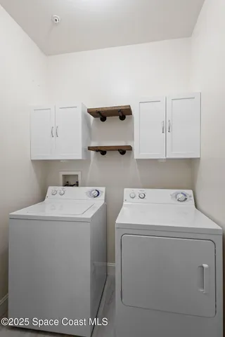 a view of a glass door and deck