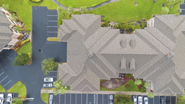 an aerial view of a city with houses