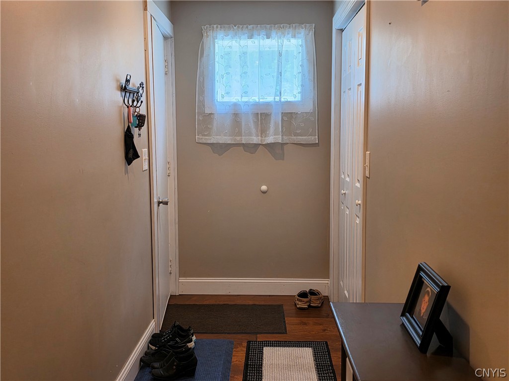 147 Gildner Road Central Square, NY 13036 - Photo 26 of 48 Entry hallway to lower level, door on left leads to garage stairs