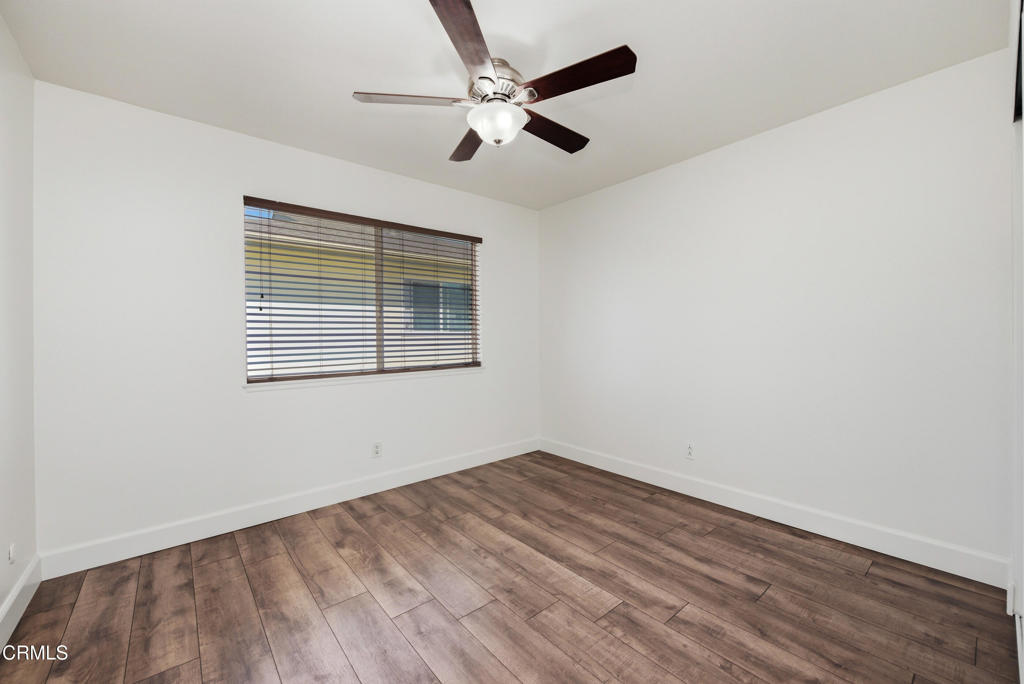 1210 Carlsbad Place Ventura, CA 93003 - Photo 15 of 22 an empty room with a window and a ceiling fan