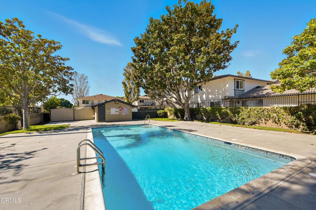 1210 Carlsbad Place Ventura, CA 93003 - Photo 21 of 22 a view of a white house with a yard