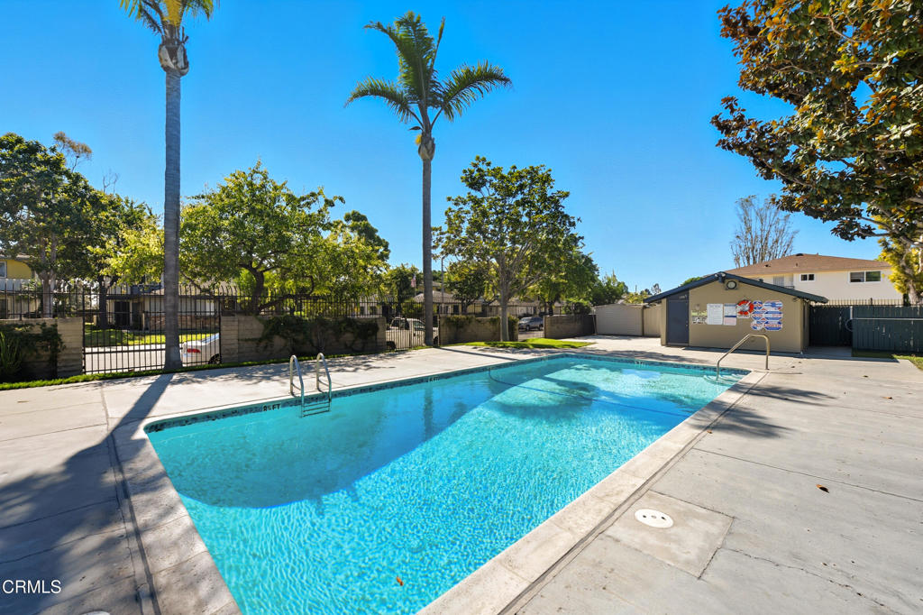 1210 Carlsbad Place Ventura, CA 93003 - Photo 22 of 22 a view of a swimming pool with a yard