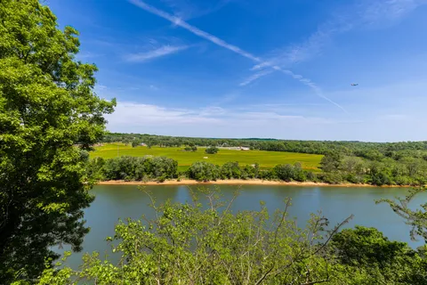 a view of a lake with a city view