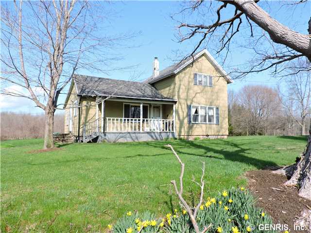 Exterior Front. Newer roof, open front porch.