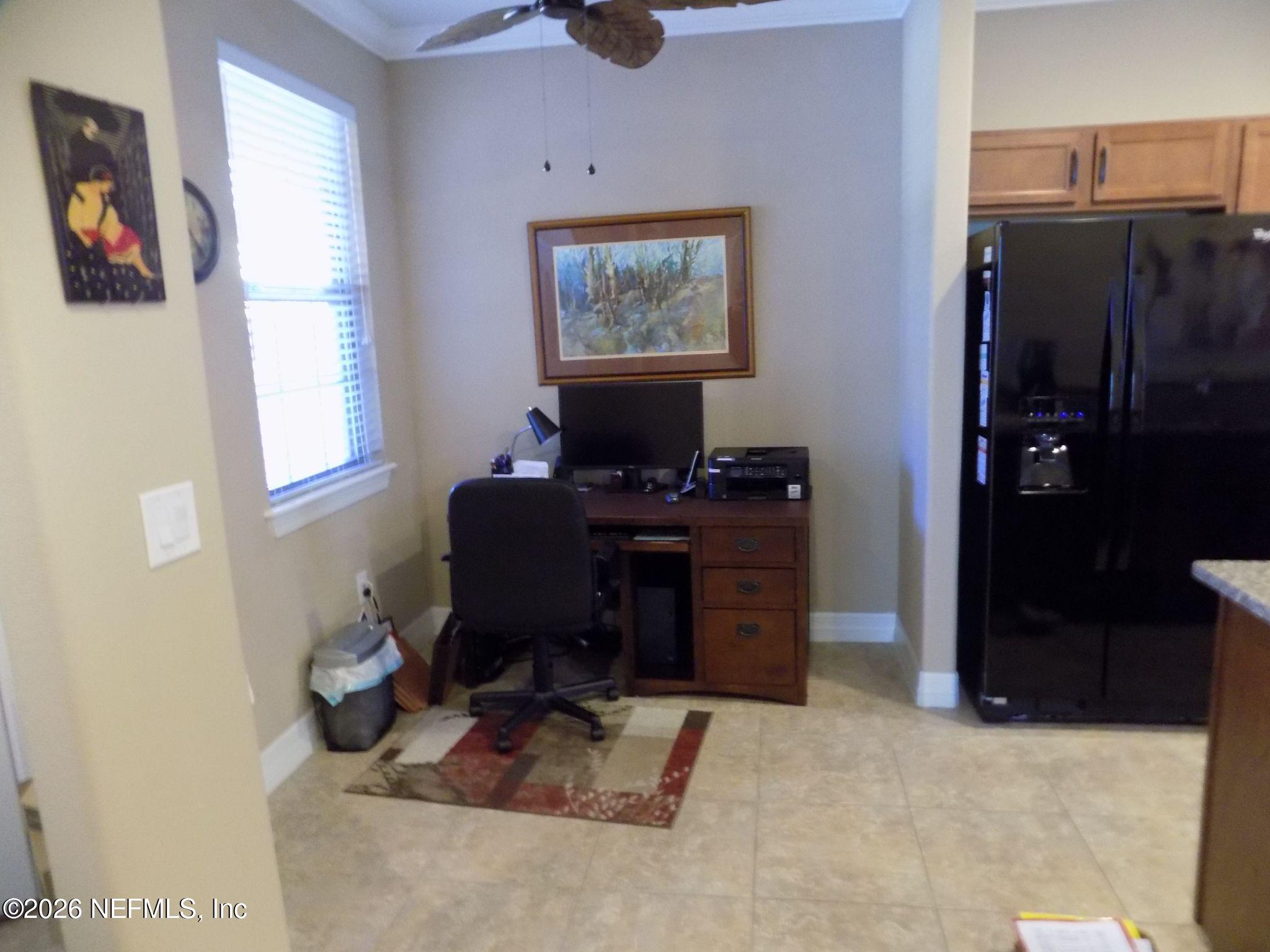 144 Goldenrod Park Road Ponte Vedra, FL 32081 - Photo 12 of 40 a view of a workspace with furniture and a window