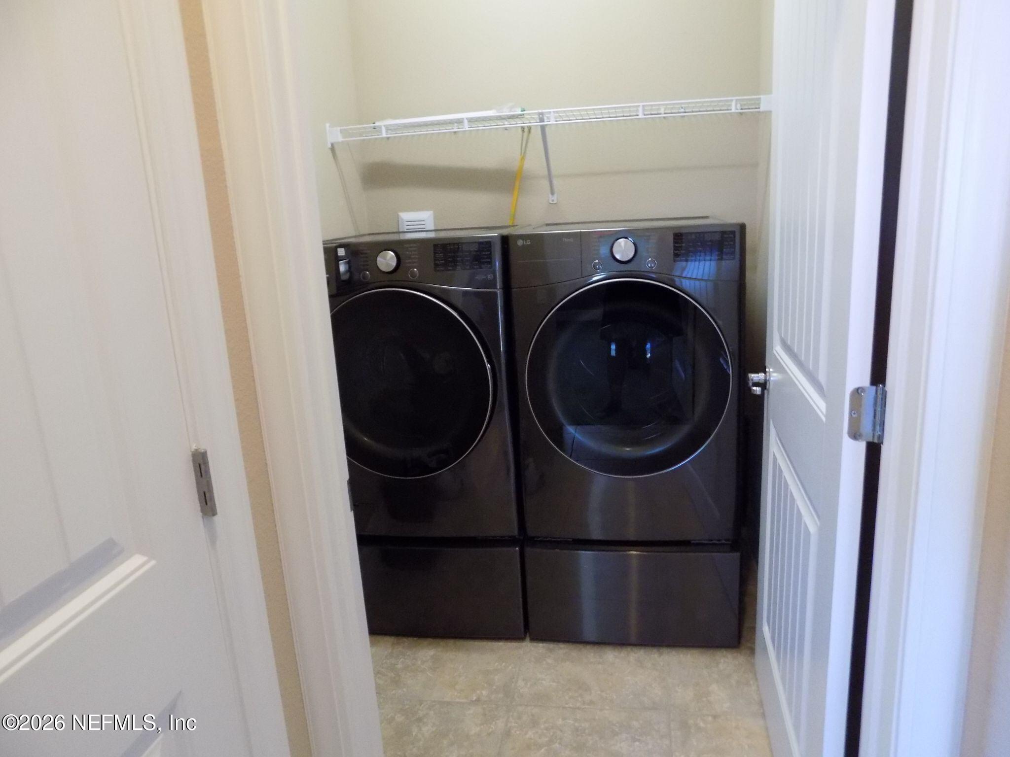 144 Goldenrod Park Road Ponte Vedra, FL 32081 - Photo 20 of 40 a utility room with dryer and washer