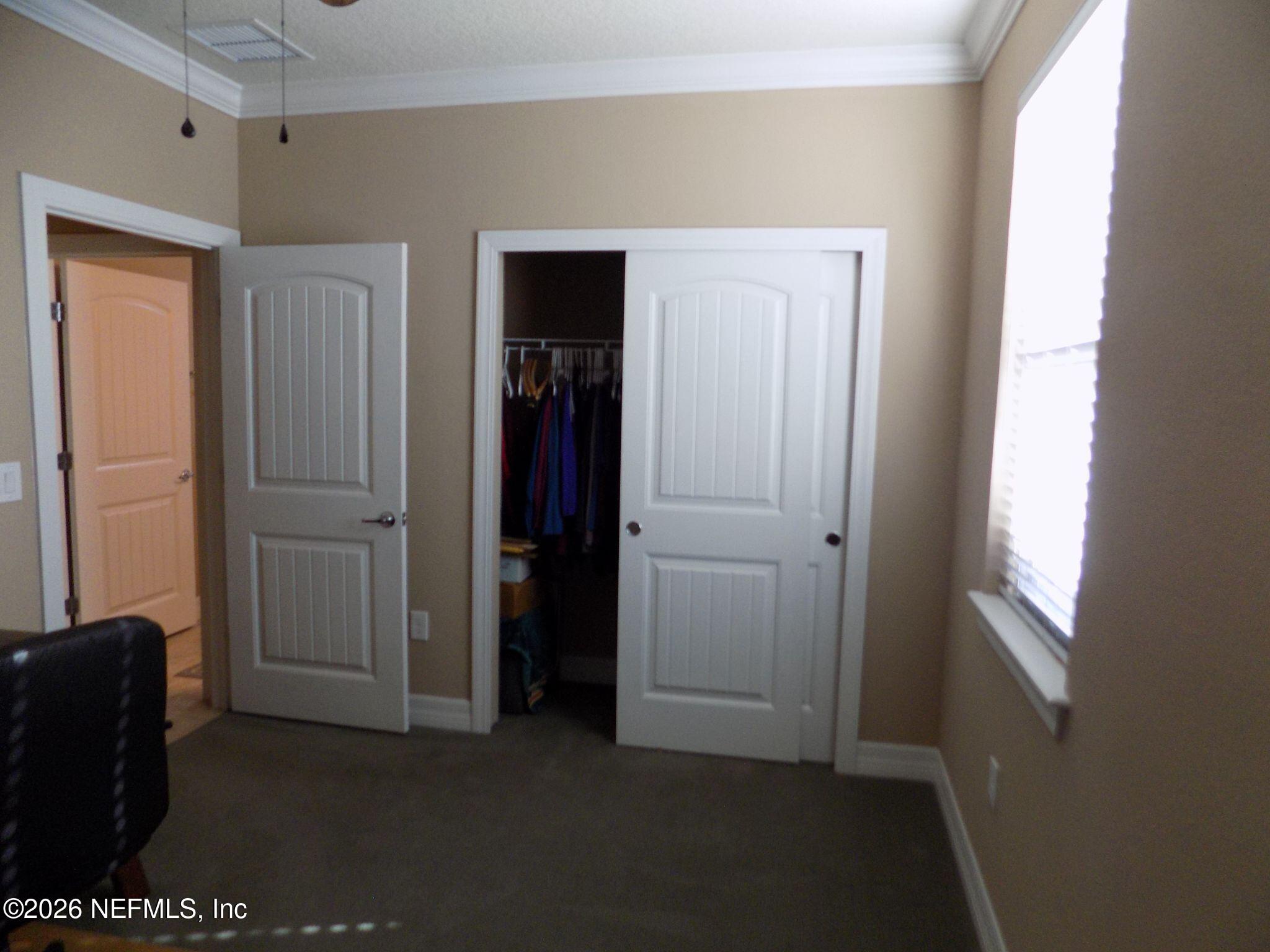 144 Goldenrod Park Road Ponte Vedra, FL 32081 - Photo 28 of 40 a view of an empty room with a window