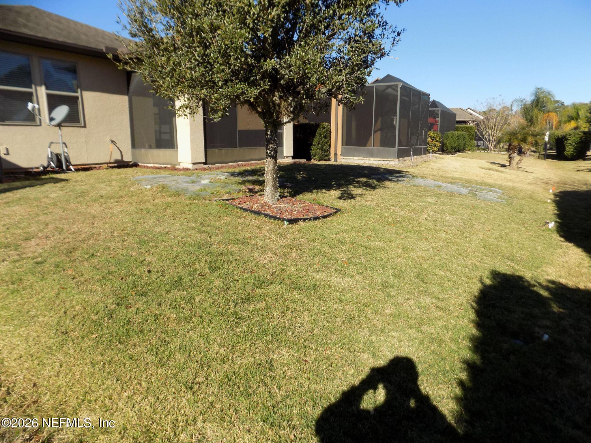 144 Goldenrod Park Road Ponte Vedra, FL 32081 - Photo 38 of 40 a front view of a house with a yard