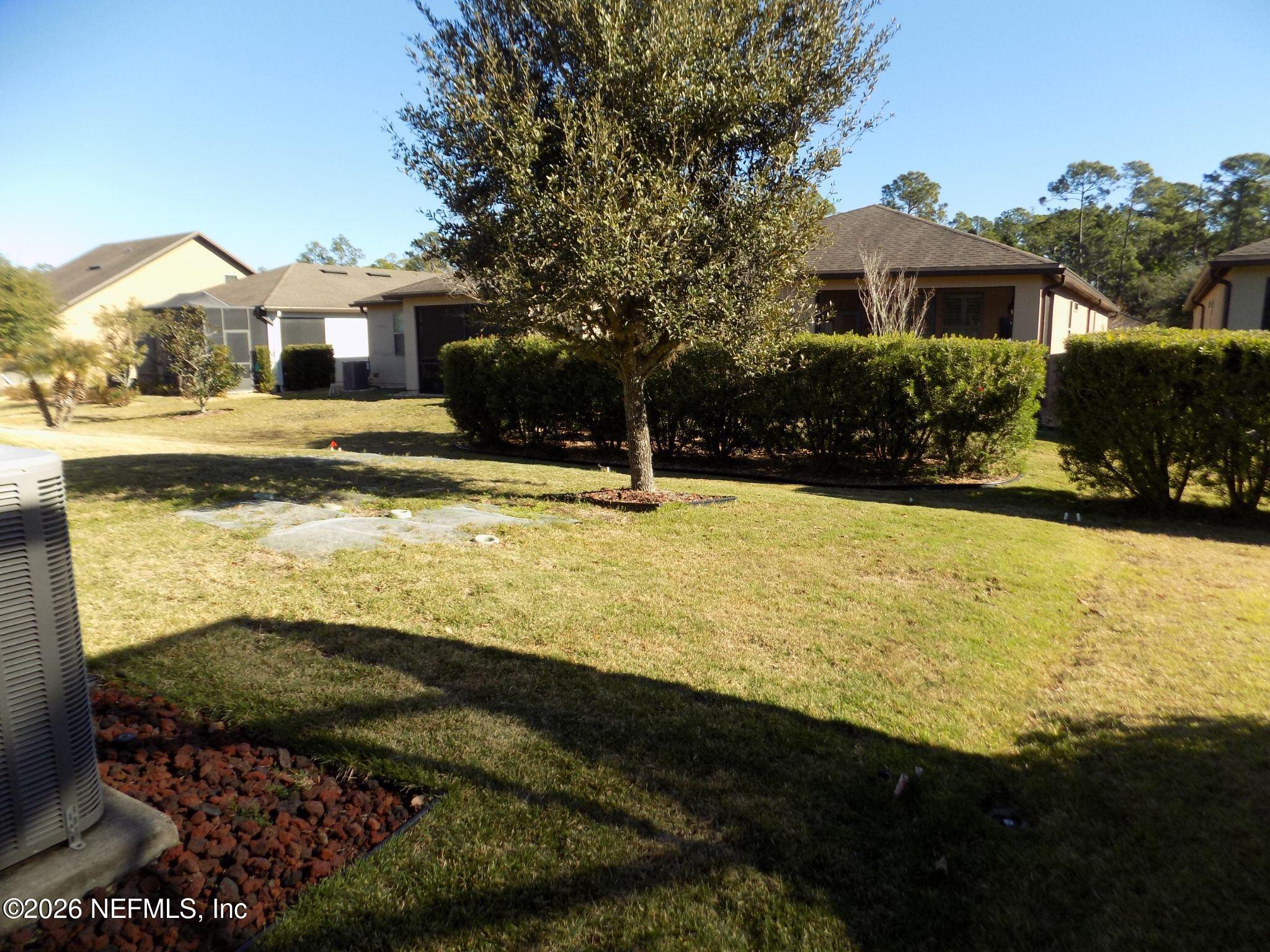 144 Goldenrod Park Road Ponte Vedra, FL 32081 - Photo 40 of 40 a front view of a house with yard and lake view