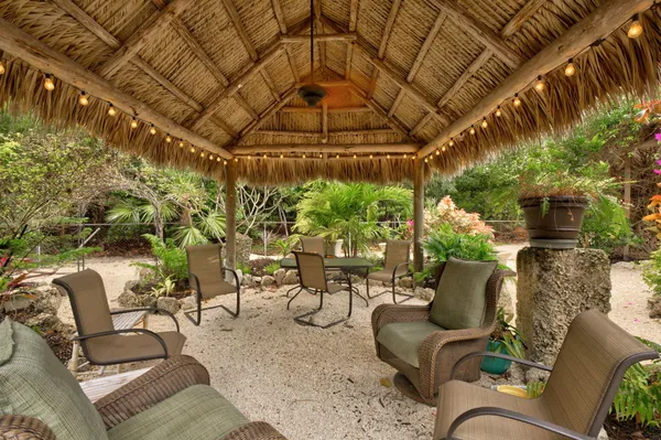 a view of a palm trees in front of a house