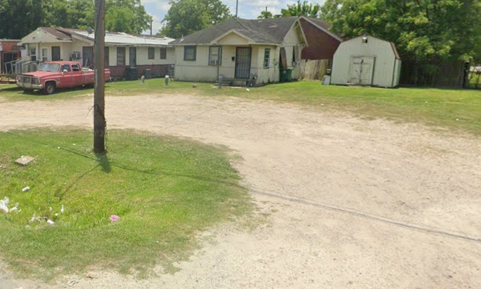 3564 Mt Pleasant Street Houston, TX 77021 - Photo 2 of 2 a front view of a house with a garden and tree