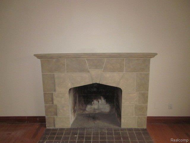4883 Audubon Road Detroit, MI 48224 - Photo 5 of 6 4883 Audubon fireplace.JPG
