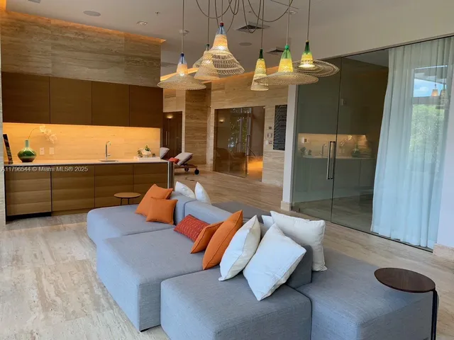 a view of a lobby with gym equipment