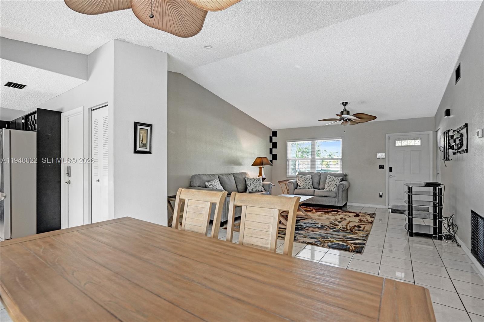 2252 Southeast Rainier Road Port St. Lucie, FL 34952 - Photo 13 of 52 a living room with furniture and wooden floor