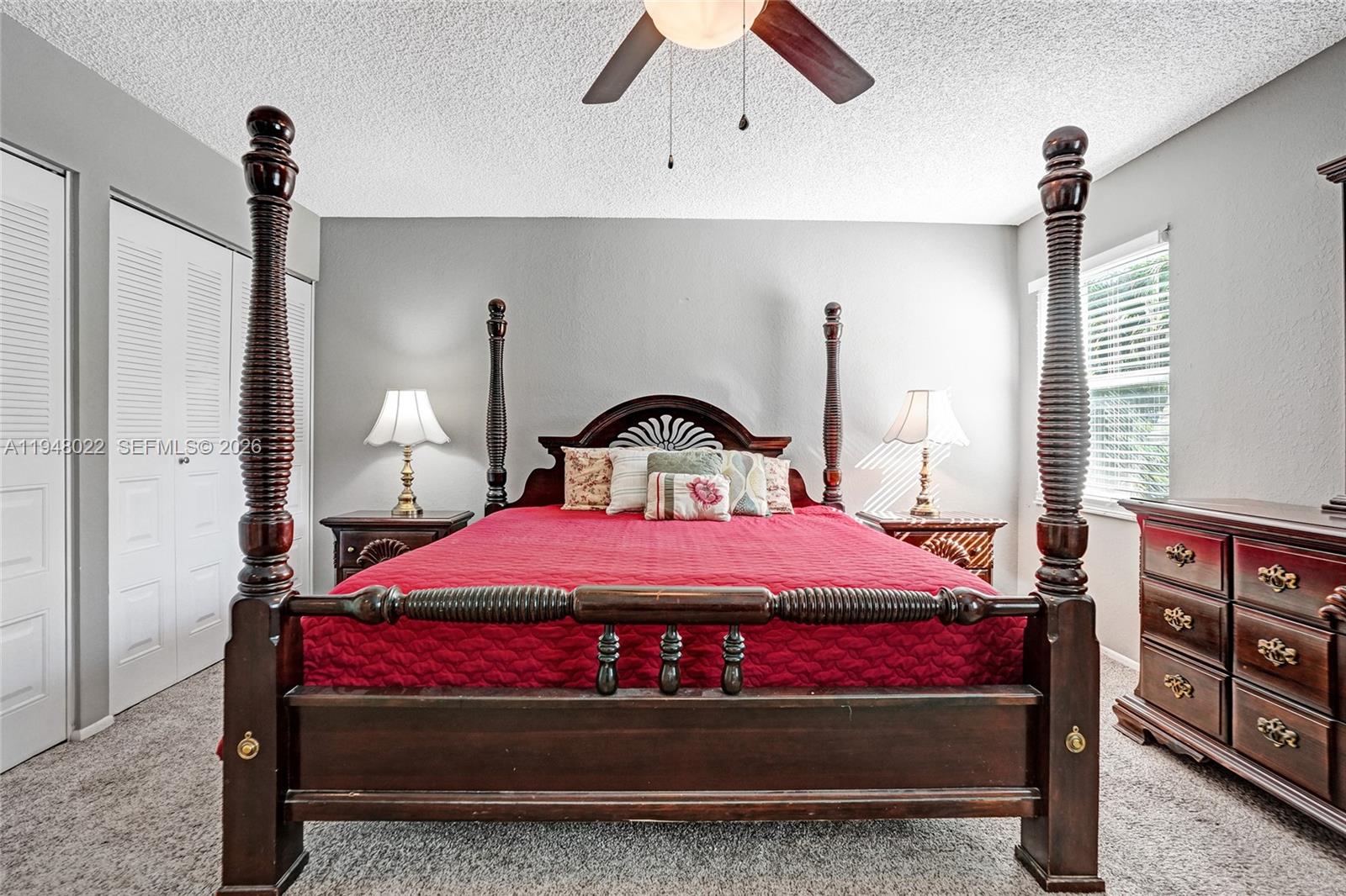 2252 Southeast Rainier Road Port St. Lucie, FL 34952 - Photo 27 of 52 a bedroom with a bed and a potted plant