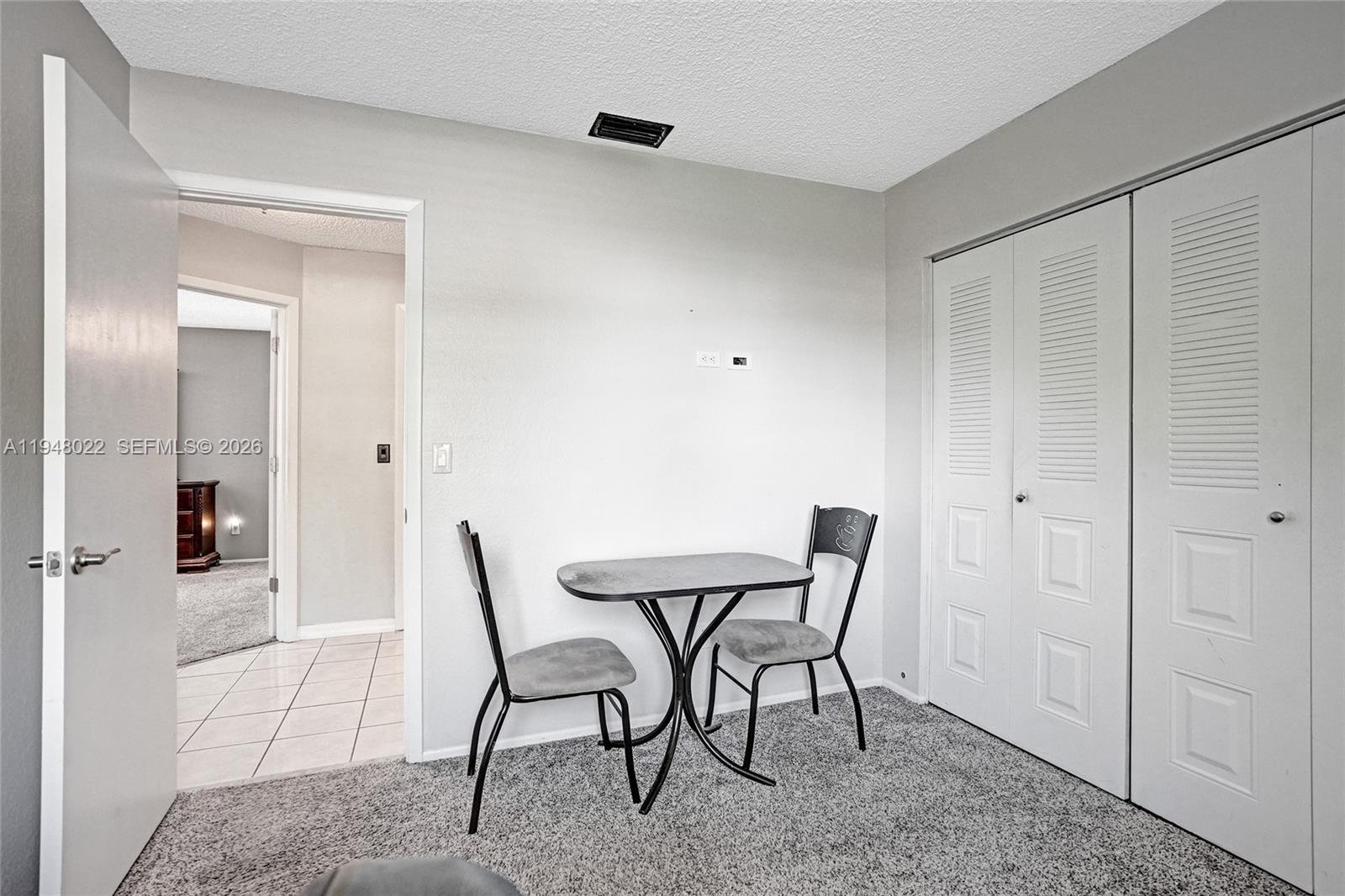 2252 Southeast Rainier Road Port St. Lucie, FL 34952 - Photo 40 of 52 a view of a hallway and dining room