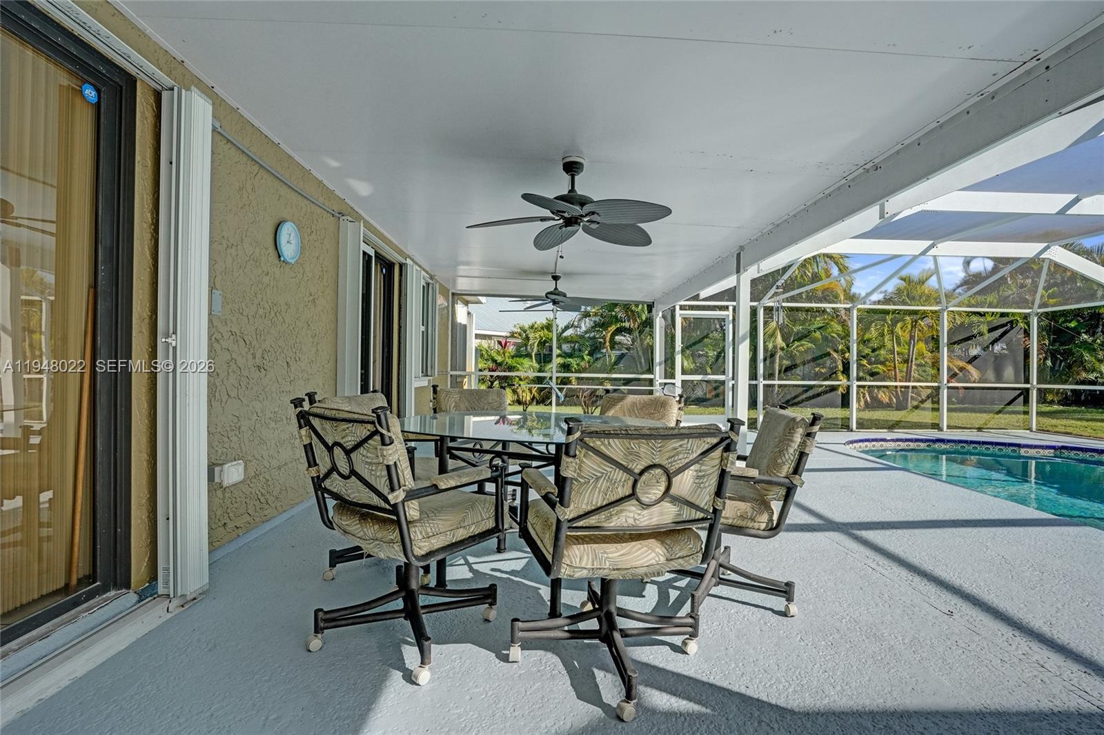 2252 Southeast Rainier Road Port St. Lucie, FL 34952 - Photo 42 of 52 a view of a dining room with furniture window and outside view