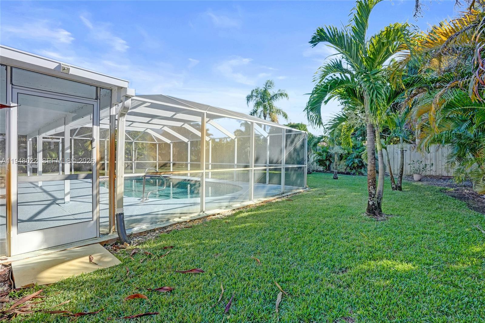 2252 Southeast Rainier Road Port St. Lucie, FL 34952 - Photo 47 of 52 a view of a backyard with a garden