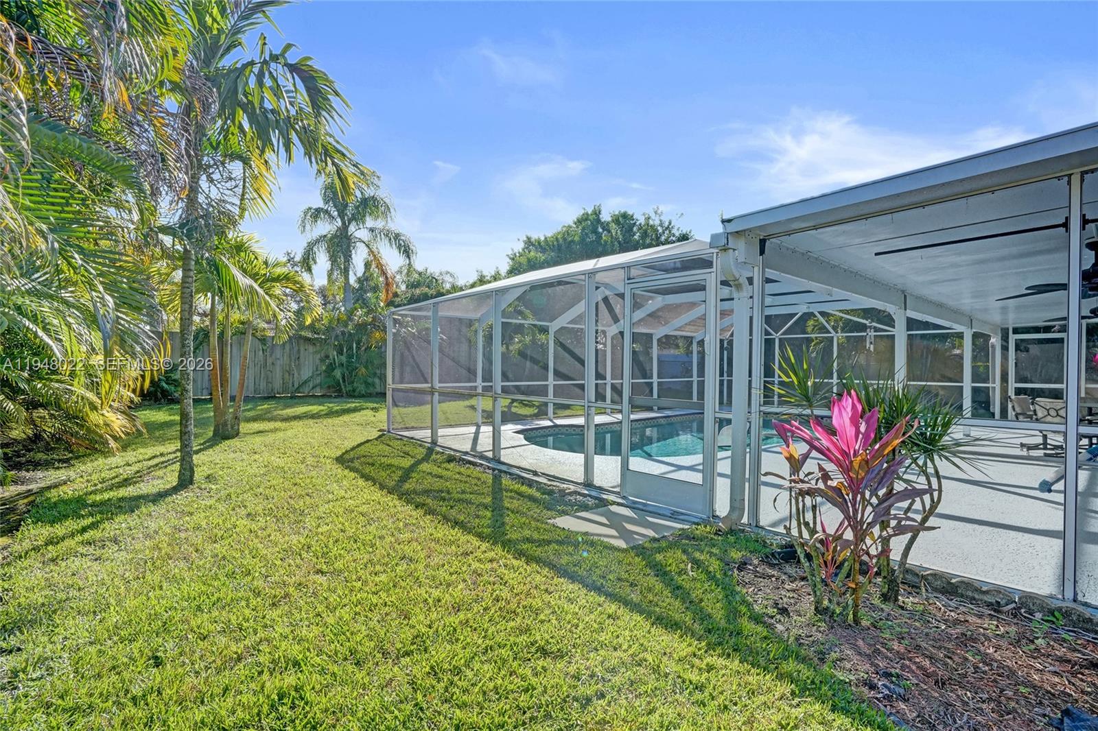 2252 Southeast Rainier Road Port St. Lucie, FL 34952 - Photo 52 of 52 a view of a backyard with sitting area