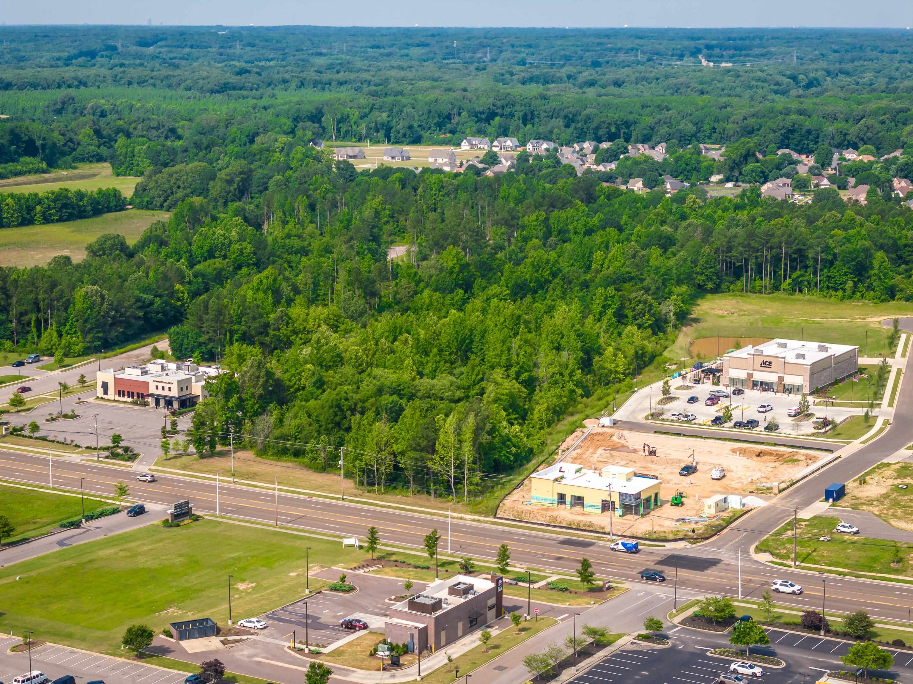 0 Airline Road Arlington, TN 38002 - Photo 12 of 19 an aerial view of a house with a garden and lake view