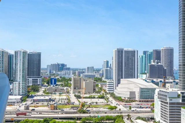 a view of city with tall buildings