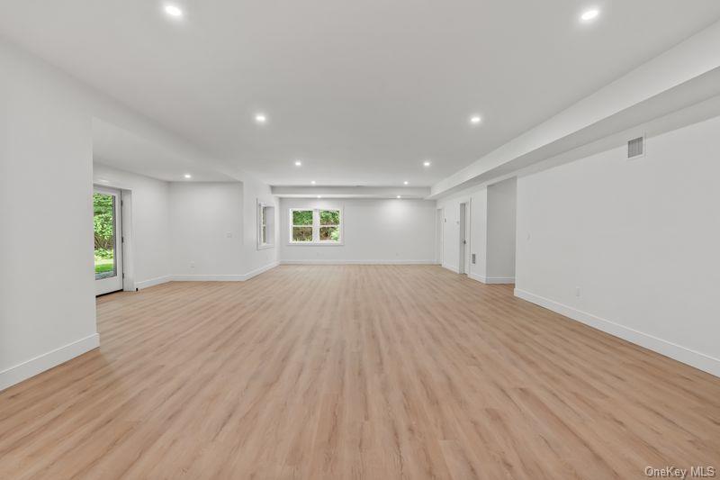 86 Old Logging Road Pound Ridge, NY 10576 - Photo 44 of 50 Oversized lower level with 9 ft ceilings and a walk out.