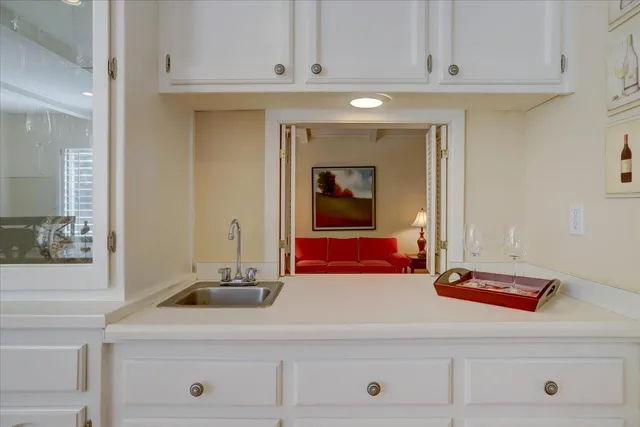 a bedroom with a bed and a chair