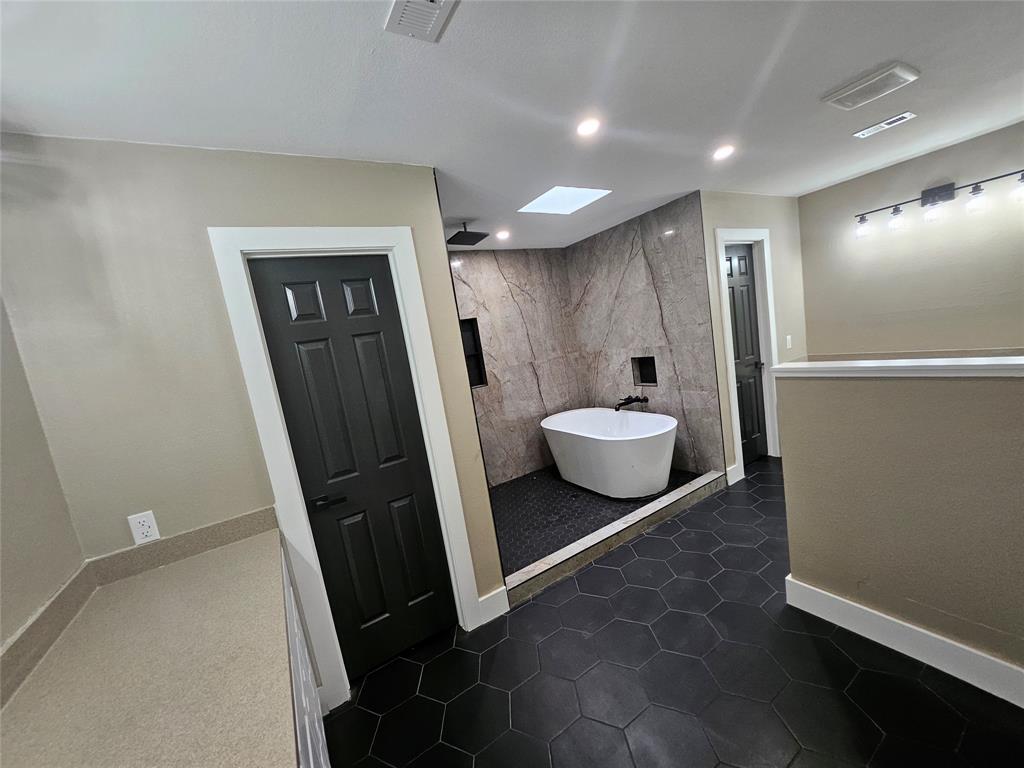 5501 Chimney Rock Road Abilene, TX 79606 - Photo 11 of 14 a bathroom with a sink and a mirror