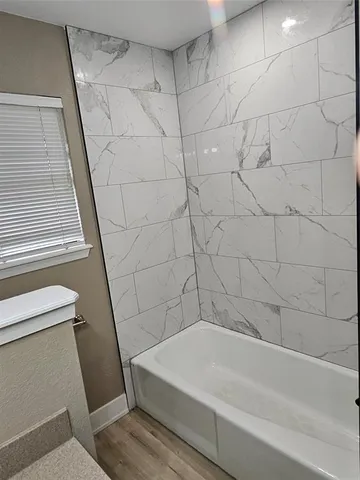 a bathroom with a bathtub