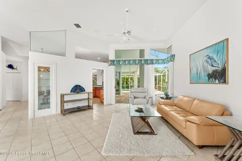 a kitchen with a sink counter top space stainless steel appliances and a large window