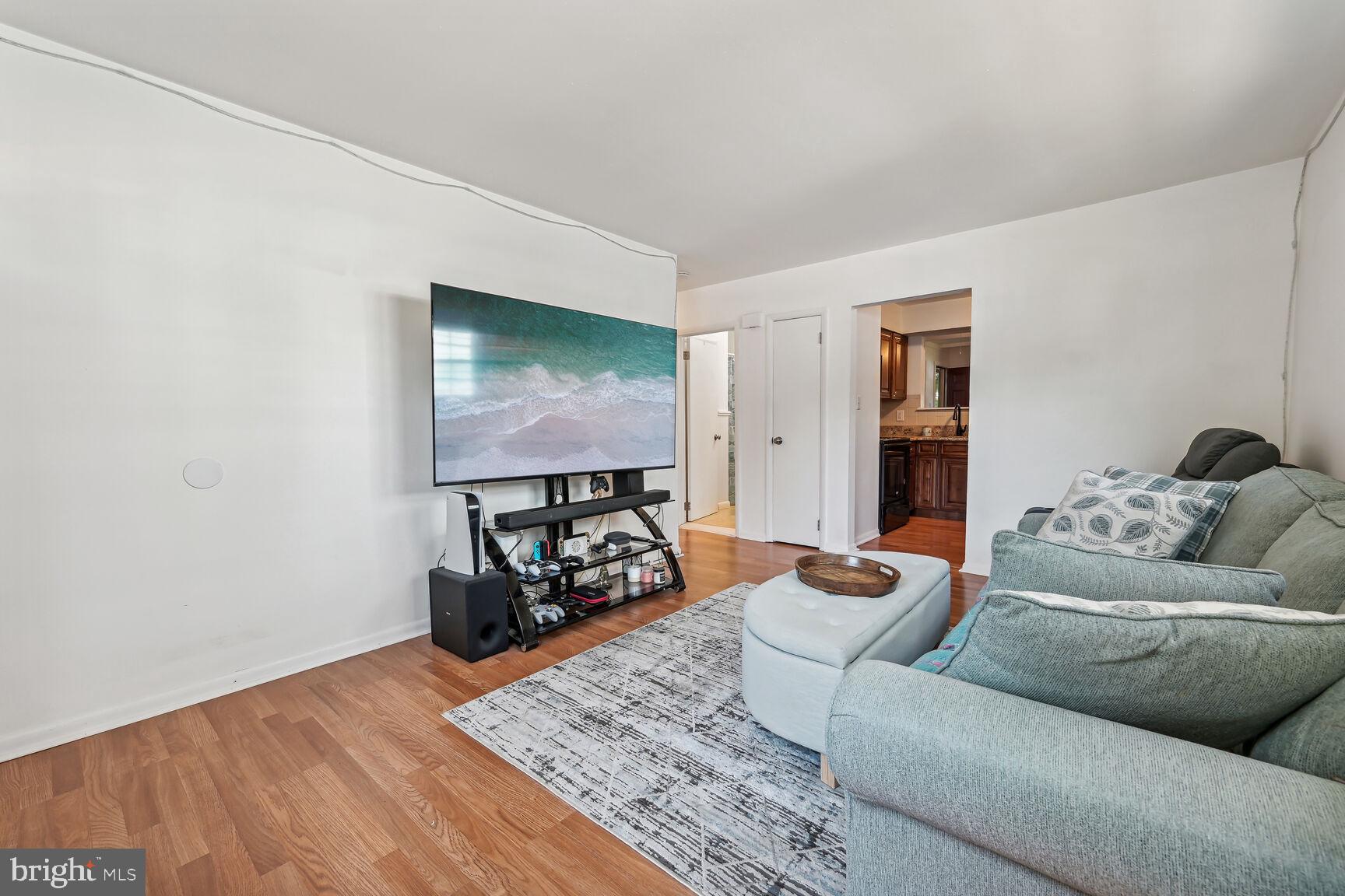 430 Richey Avenue, Unit 1A Oaklyn, NJ 08107 - Photo 4 of 13 Cozy living space with modern flair.