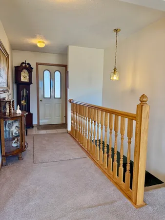 a view of hallway with livingroom