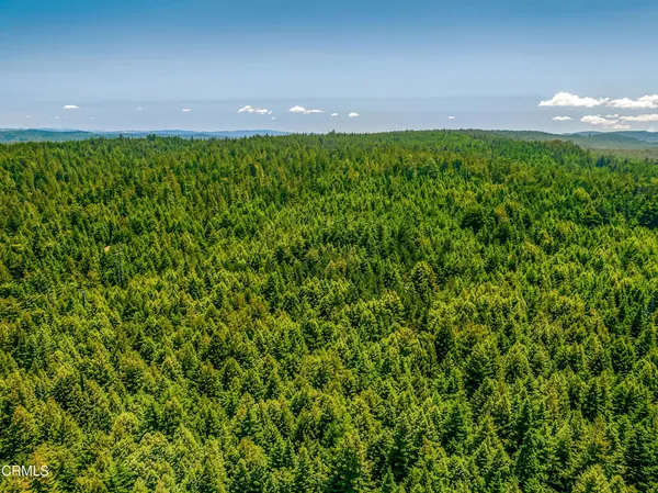 a view of a swimming pool with an outdoor space and seating area