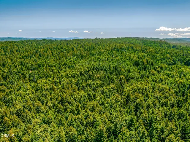 a view of a swimming pool with an outdoor space and seating area