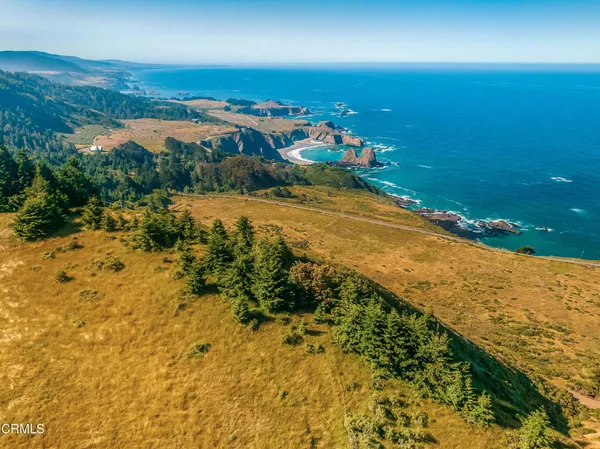 a view of a swimming pool with an outdoor space and seating area