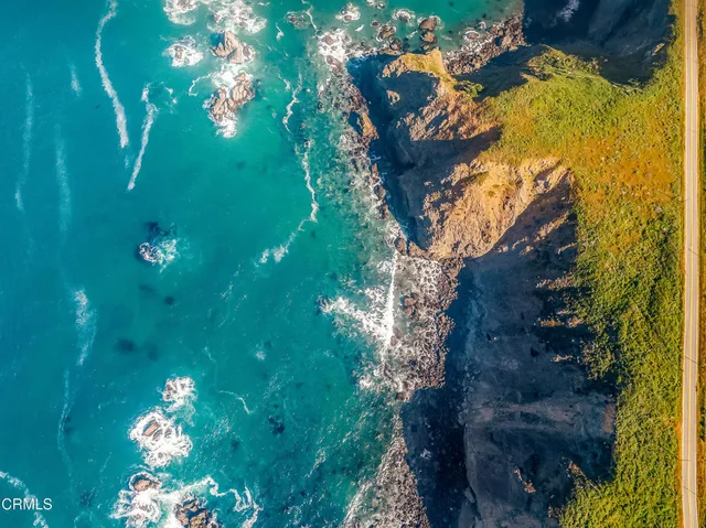 a view of a backyard of a house