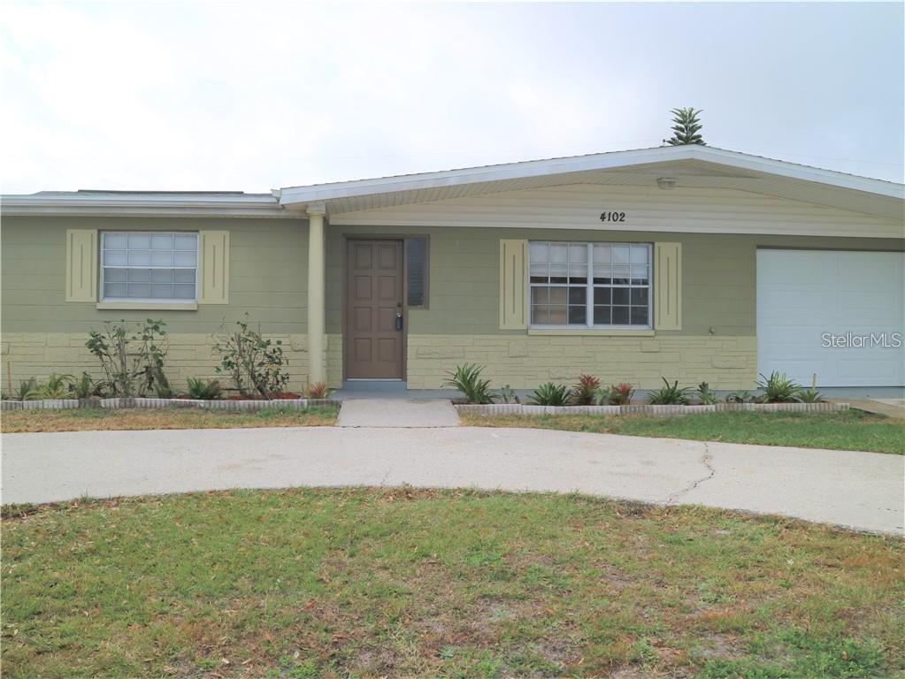 4102 Darlington Road Holiday, FL 34691 - Photo 1 of 9 a front view of a house