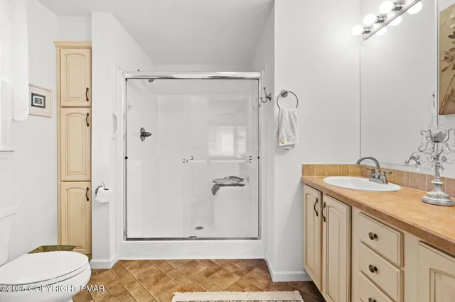 a bathroom with a sink and a toilet