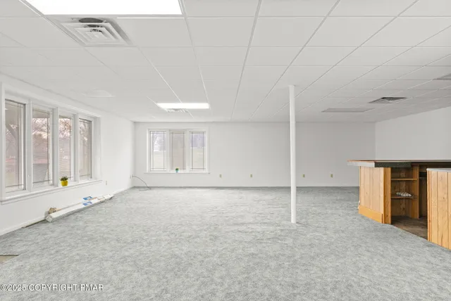 a view of a balcony with chairs