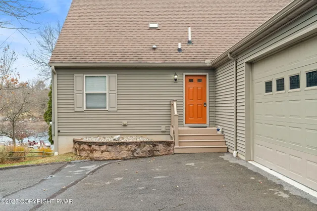 a view of an entryway with a rug